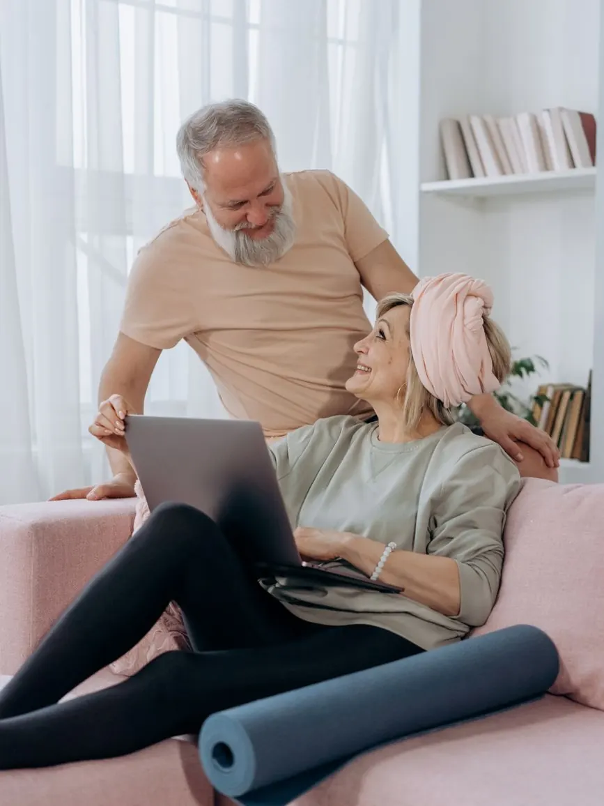 Couple on a video call with their Marrakech wedding planner from home
