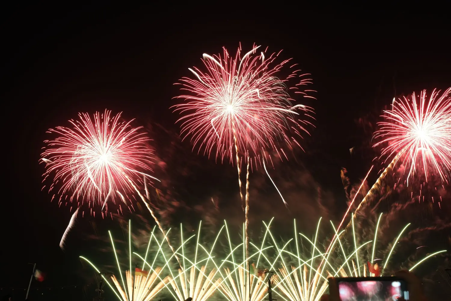 Fireworks lighting the night sky above a wedding reception terrace in Marrakech